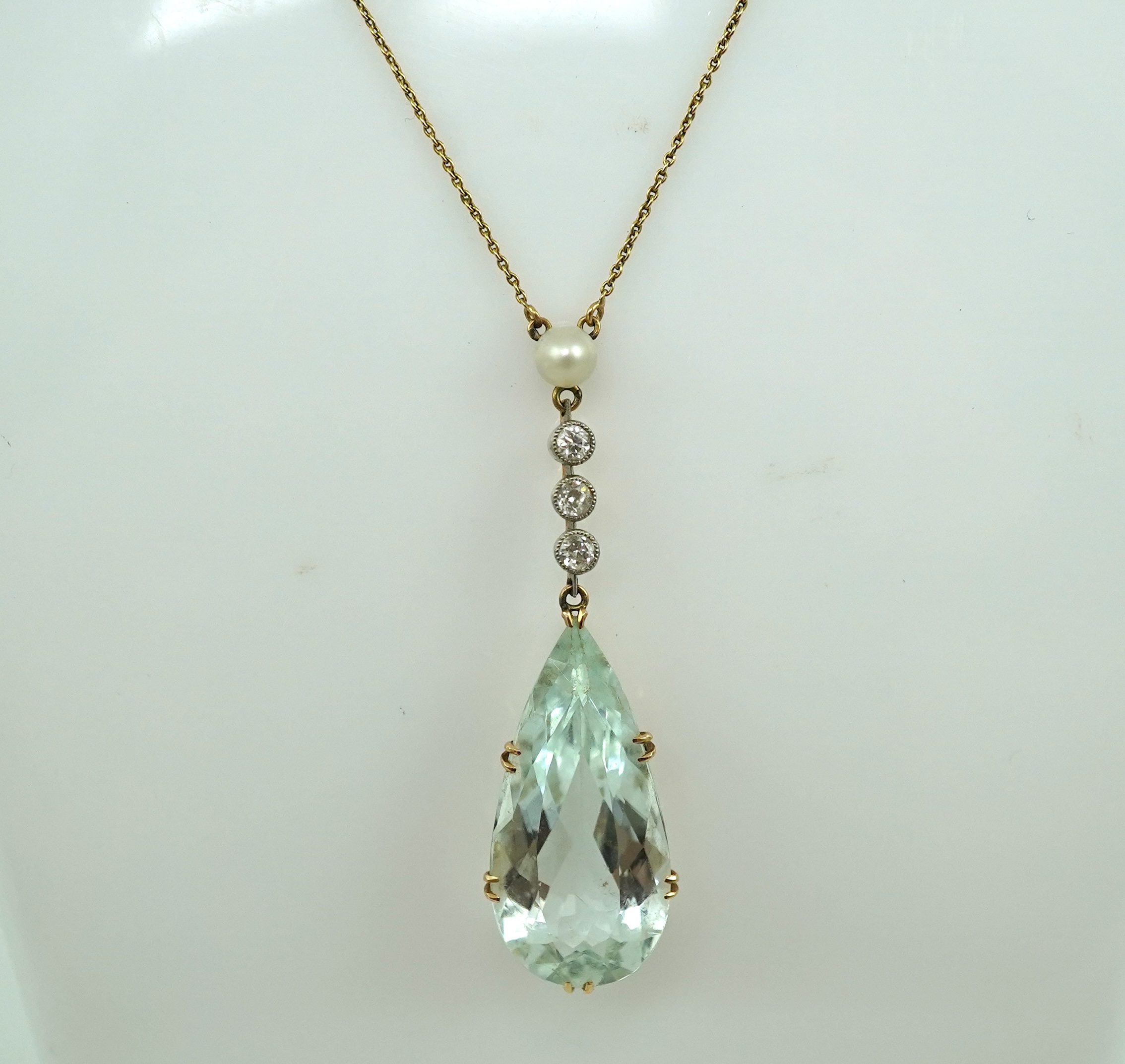 An Edwardian aquamarine, pearl and diamond pendant, early 20th century